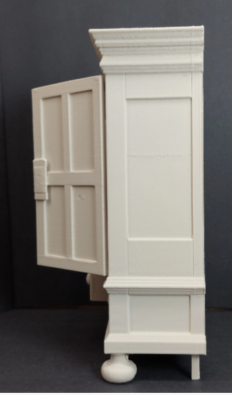 Miniature dollhouse linen cabinet – side view showing crown molding and bun feet