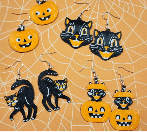 Vintage Halloween earring set 4 pairs painted orange and black on spiderweb