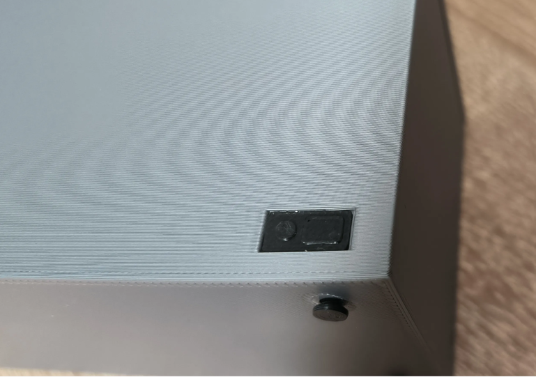 Miniature chest freezer close-up of latch detail