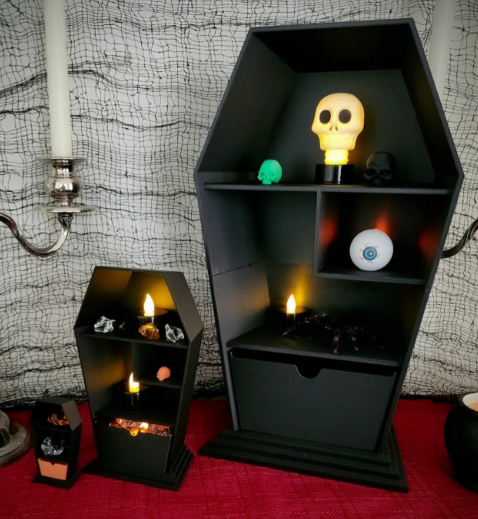 3D printed coffin shelves in two sizes styled with crystals and candles