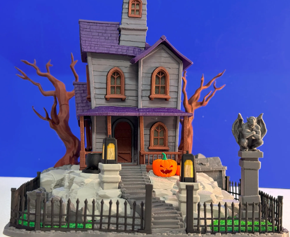 Illuminated Halloween Haunted House Scene - lantern and pumpkin detail