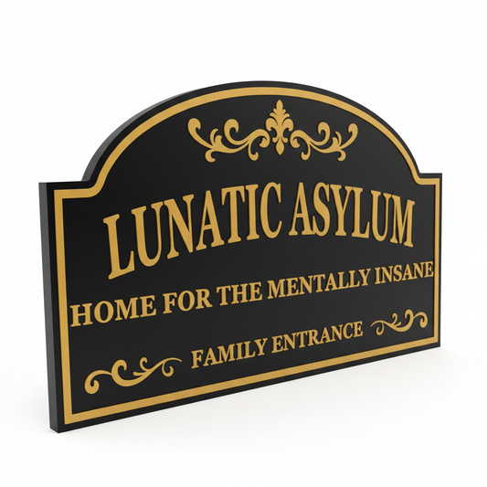 Lunatic Asylum sign plaque on white background studio shot