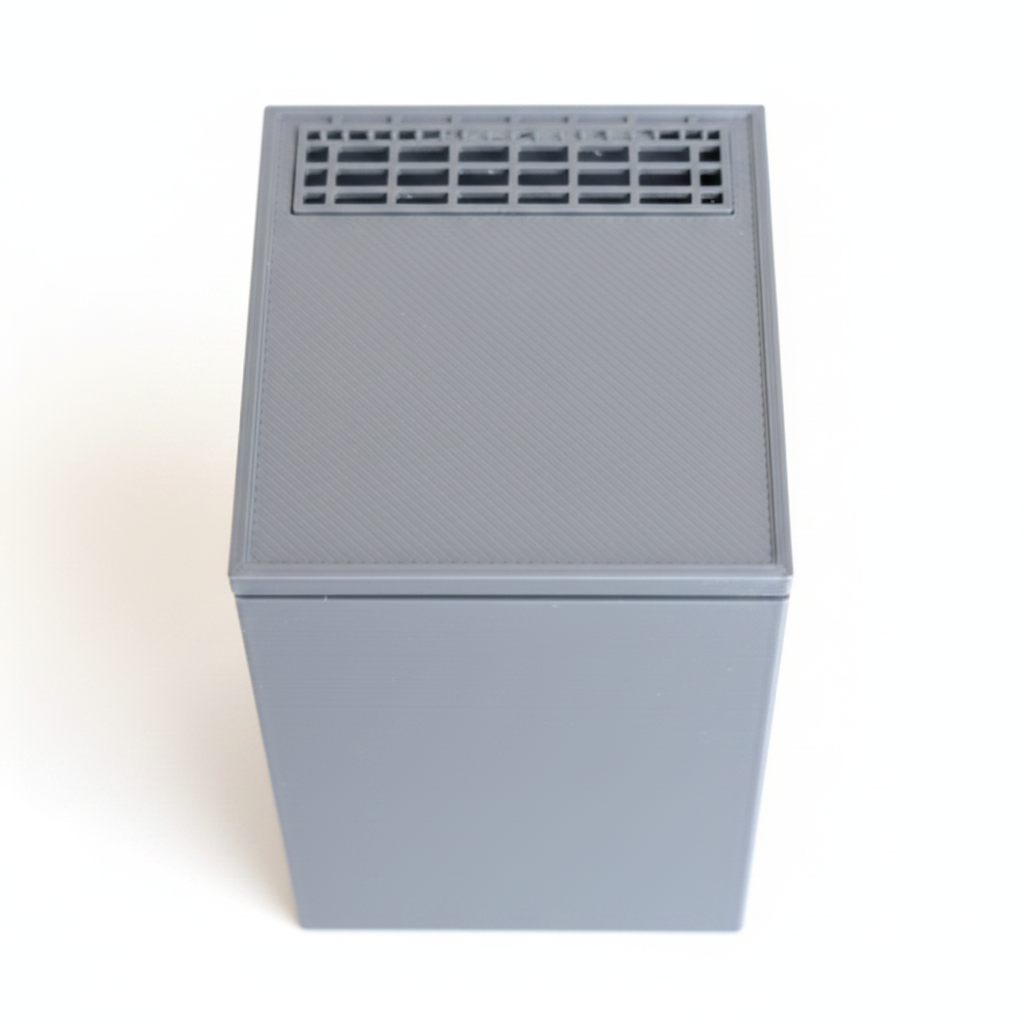 Miniature dishwasher top ventilation detail on white background