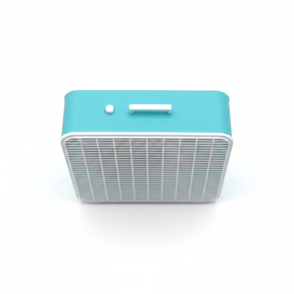 Miniature box fan top handle detail on white background
