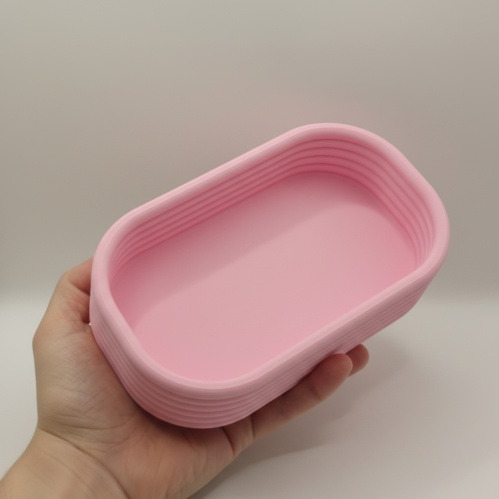 Groovy capsule tray held in hand showing scale