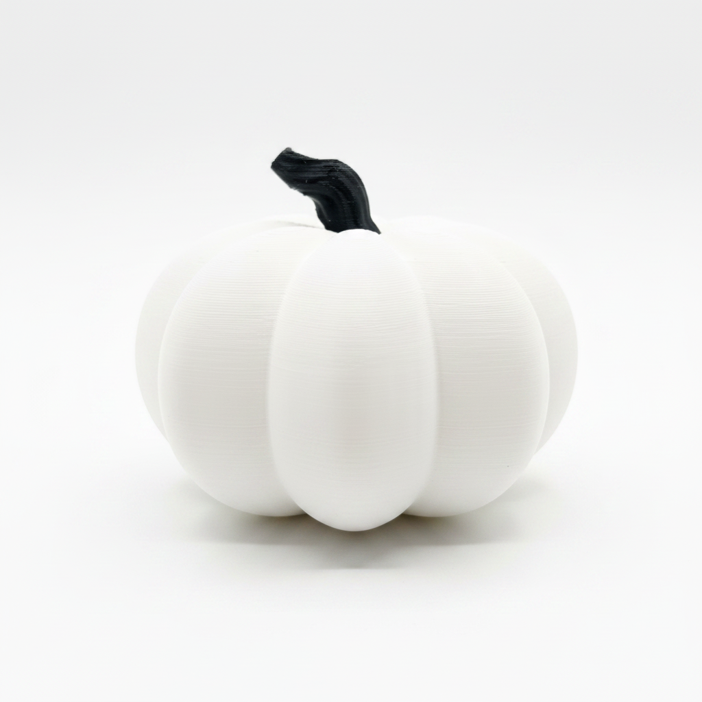 3D printed decorative pumpkin on white background studio shot