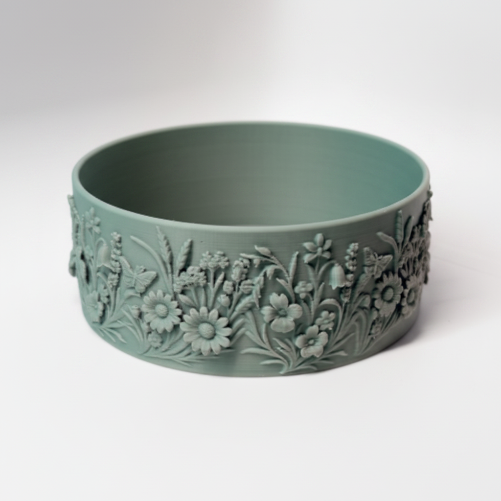 Mid-Summer Eve Bowl in sage green showing floral relief exterior
