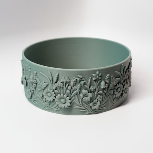 Mid-Summer Eve Bowl in sage green showing floral relief exterior