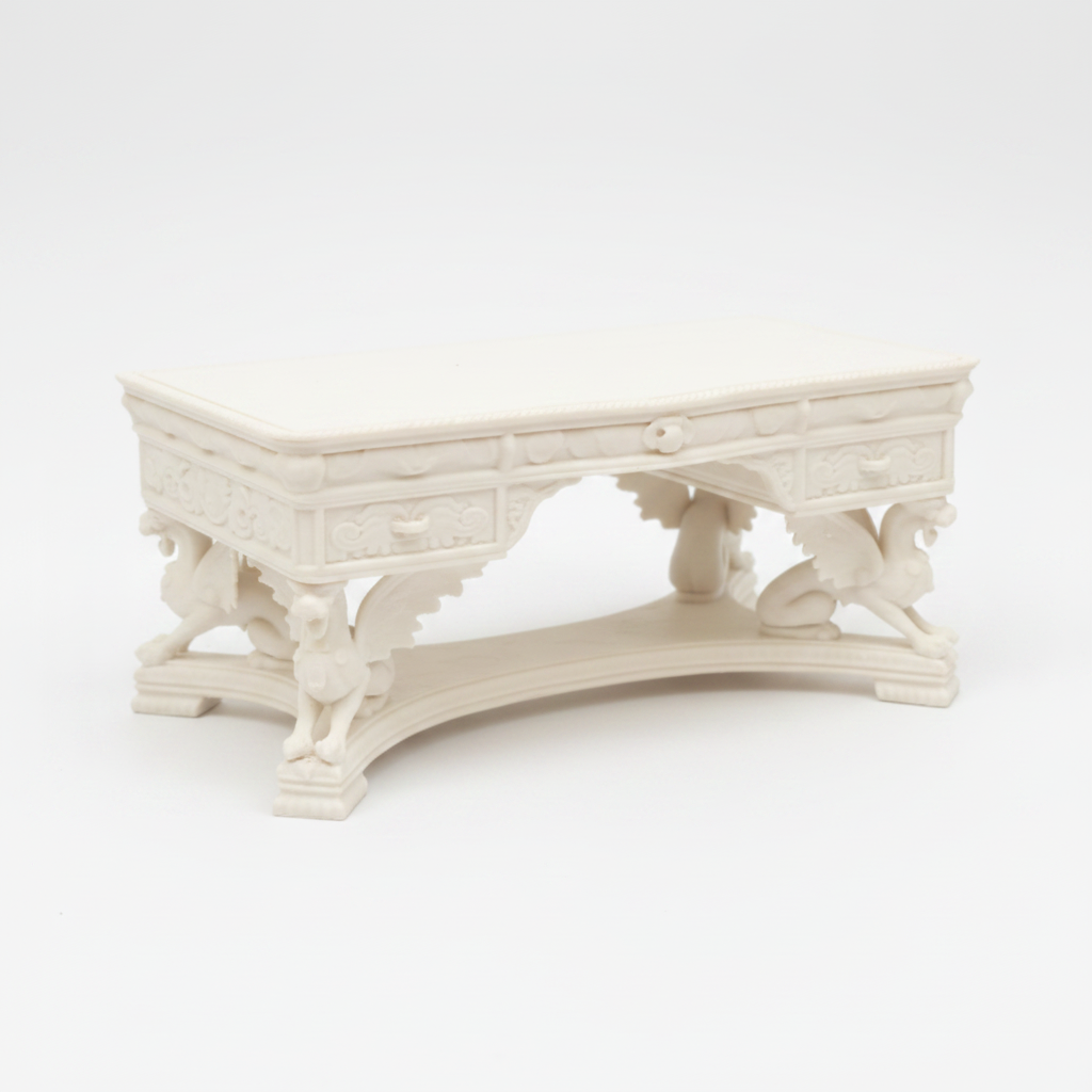 Miniature griffin library table white background studio shot