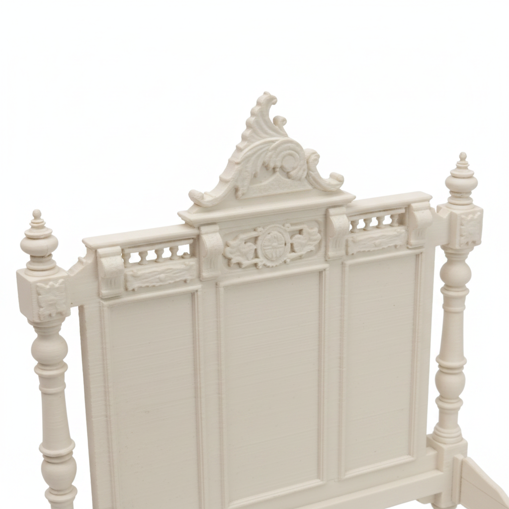 Miniature baroque bed frame close-up detail on white background