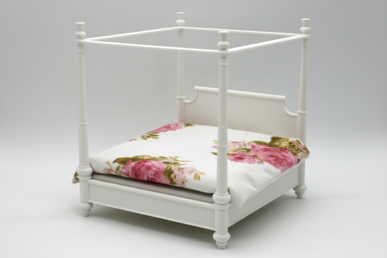 Miniature canopy four-poster bed white background front view with floral bedspread