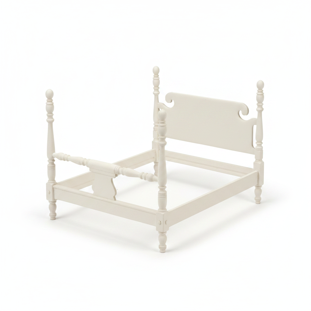 Victorian miniature bed frame white background studio shot