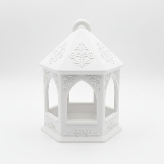 Elegant hexagonal bird feeder in white, clean studio product shot