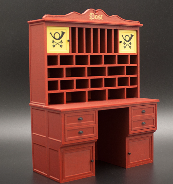 Miniature post office cabinet with open drawers and doors