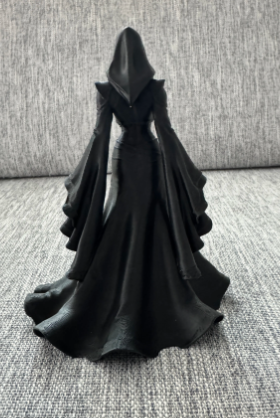 Lady Reaper - rear view showing flowing train and hood detail