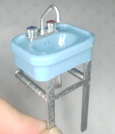1:12 Retro Pedestal Sink - front view showing chrome legs and blue basin